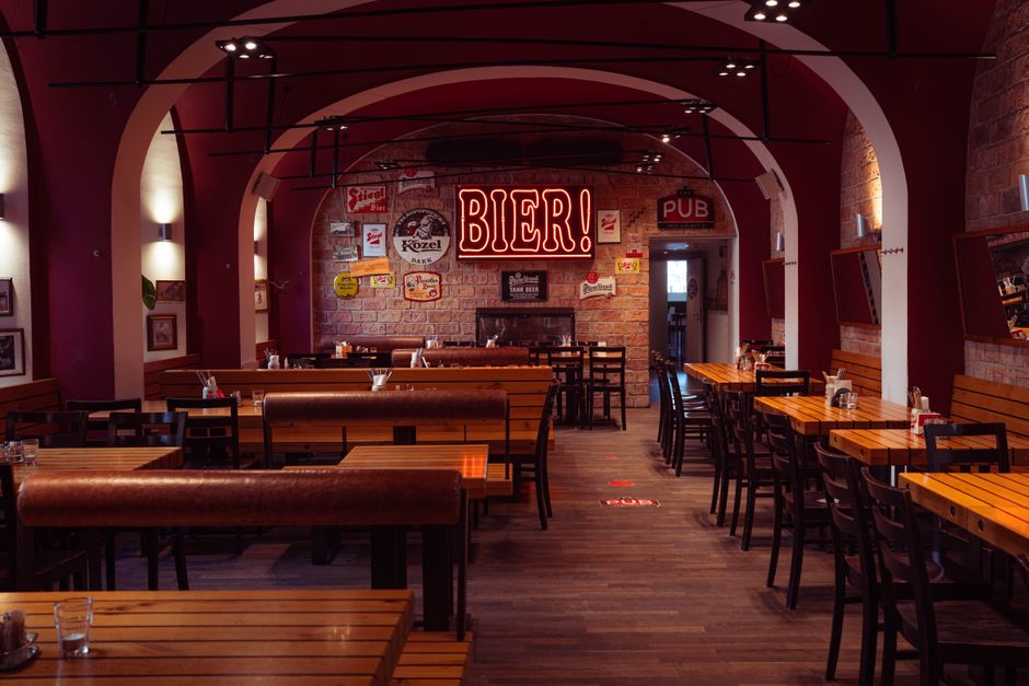 Restaurant dining ambiance with warm lighting and comfortable seating