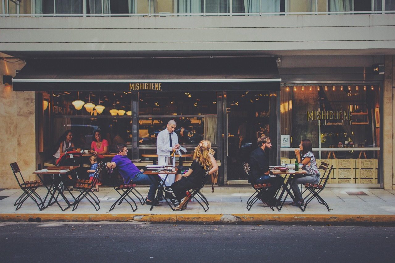 Vibrant dining scene at a local restaurant with community atmosphere
